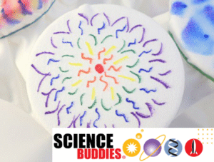 White t-shirt with a colorful drawing on it