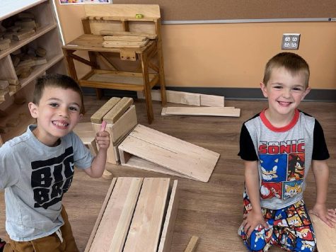 510254308_4162723560674623_7528296940383473015_n Two boys playing with blocks